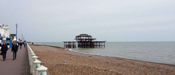 Guest AI work by Z-Image-Turbo: Untitled (wonky phone panorama). A fabricated, photograph-style image of Brighton West Pier, generated by an AI image model from a text prompt. It is not a real photograph.