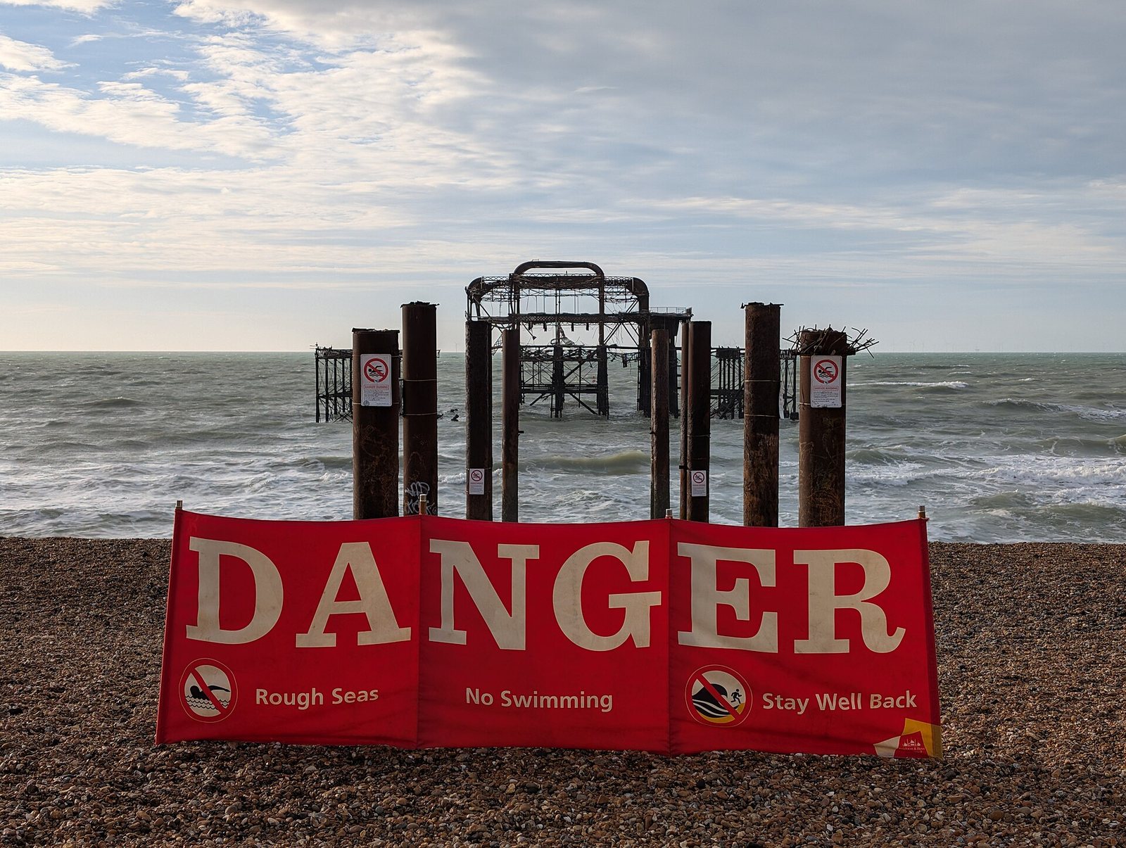 DANGER banner in front of Brighton West Pier 2025-11-12 by Andy Li