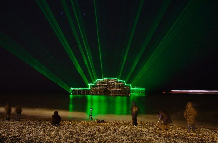 Brighton's West Pier illuminated with lasers (2010) by Lost delivery 99